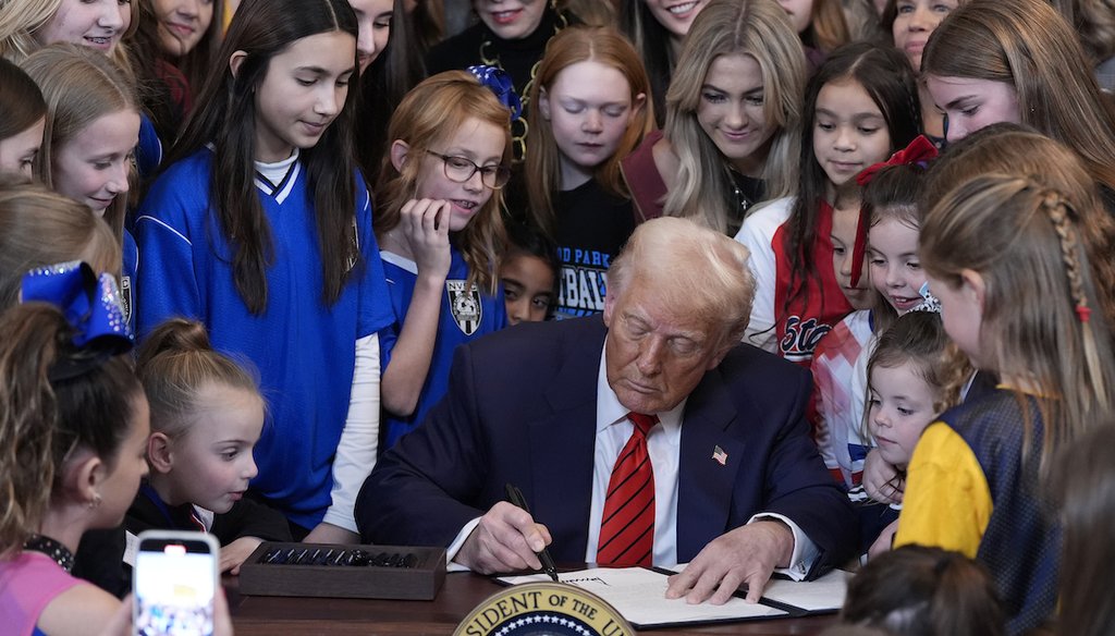 President Donald Trump signs an executive order barring transgender female athletes from competing in women's or girls' sporting events, in the White House, Feb. 5, 2025, in Washington. (AP)