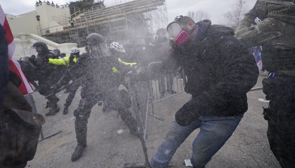 In this Jan. 6, 2021 photo, supporters of then-President Donald Trump try to break through a police barrier at the Capitol in Washington. (AP)